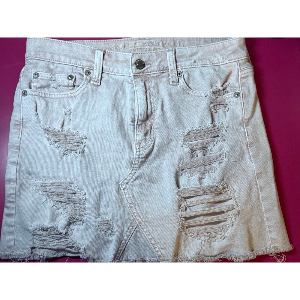 American Eagle Outfitters light pink distressed denim mini skirt size 2